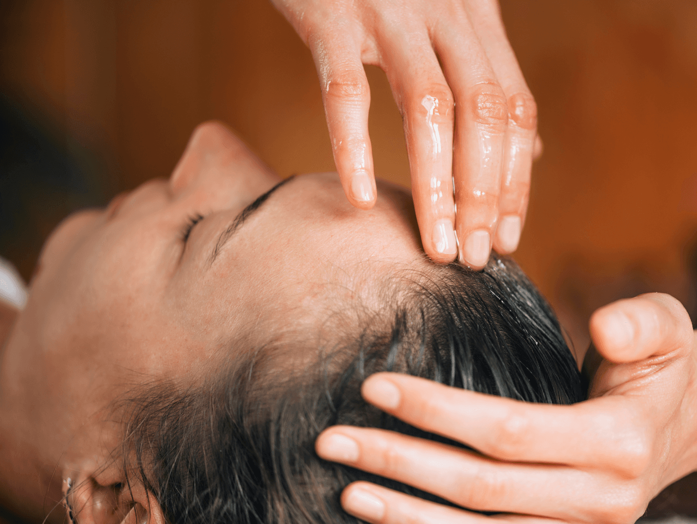 Close-up of a professional conditioning treatment with scalp massage at John Richards Hairdressing, Allington, Maidstone, helping restore soft, healthy hair.